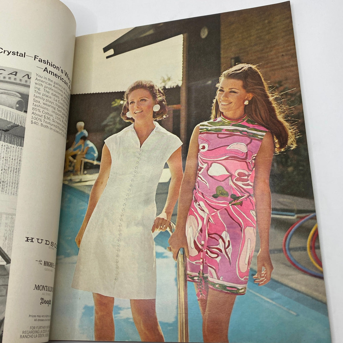 Fashion photo from VTG Vogue Magazine January 1 1968 displaying two models in stylish dresses by a swimming pool.