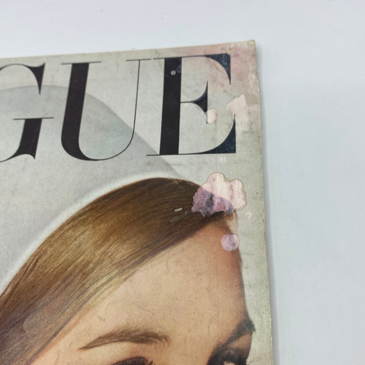 Cover of VTG Vogue Magazine January 15, 1963 featuring signs of wear and blemishes, showcasing vintage fashion elegance.