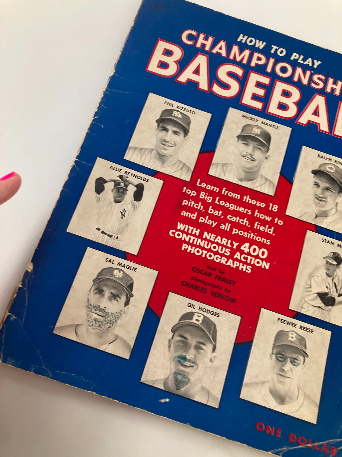 Close-up of the 'September 30 1956 How To Play Championship Baseball' program showing players like Allie Reynolds and Gil Hodges.