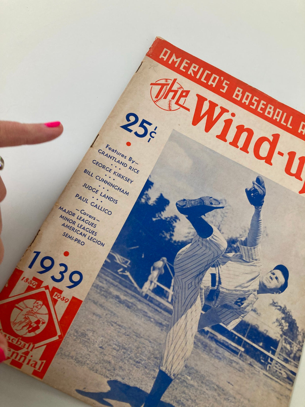Cover of 1939 America's Baseball Annual: The Wind-up featuring notable sportswriters Grantland Rice and George Kirksey, displaying a baseball player in action, with a price of 25 cents.