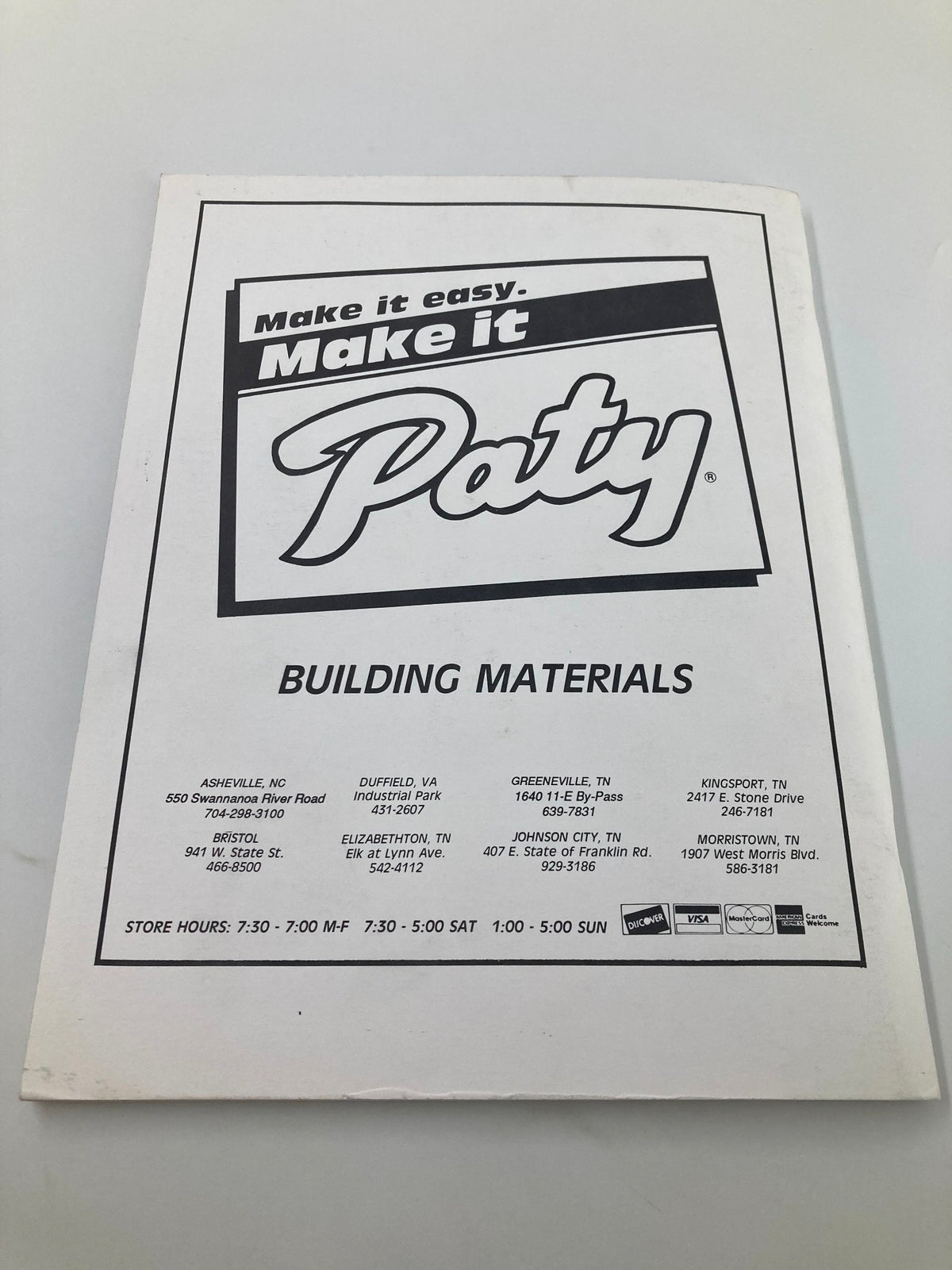 Back cover of a promotional booklet from Paty Building Materials featuring details about store hours, in relation to the Record Book 1994 Edition Appalachian League Statistical Champs.