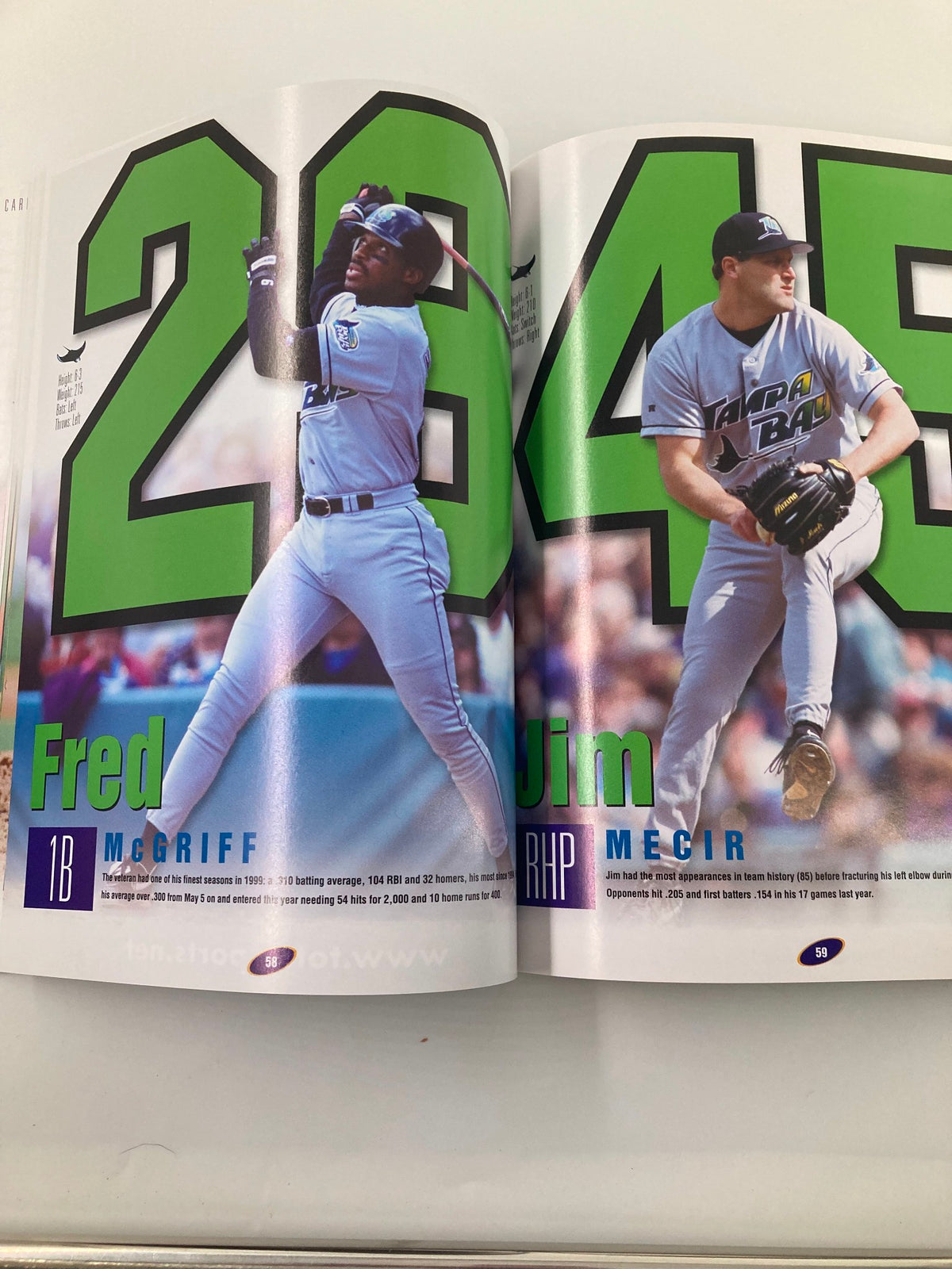 2000 MLB Devil R Us Yearbook highlighting Fred McGriff and Jim Mecir, with detailed stats and stylish player images.