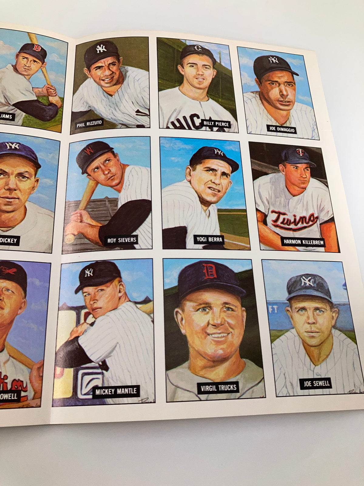 1982 MLB New York Yankees Official Yearbook American League Champions, highlighting additional portraits of Yankees legends, including Mickey Mantle and Yogi Berra.