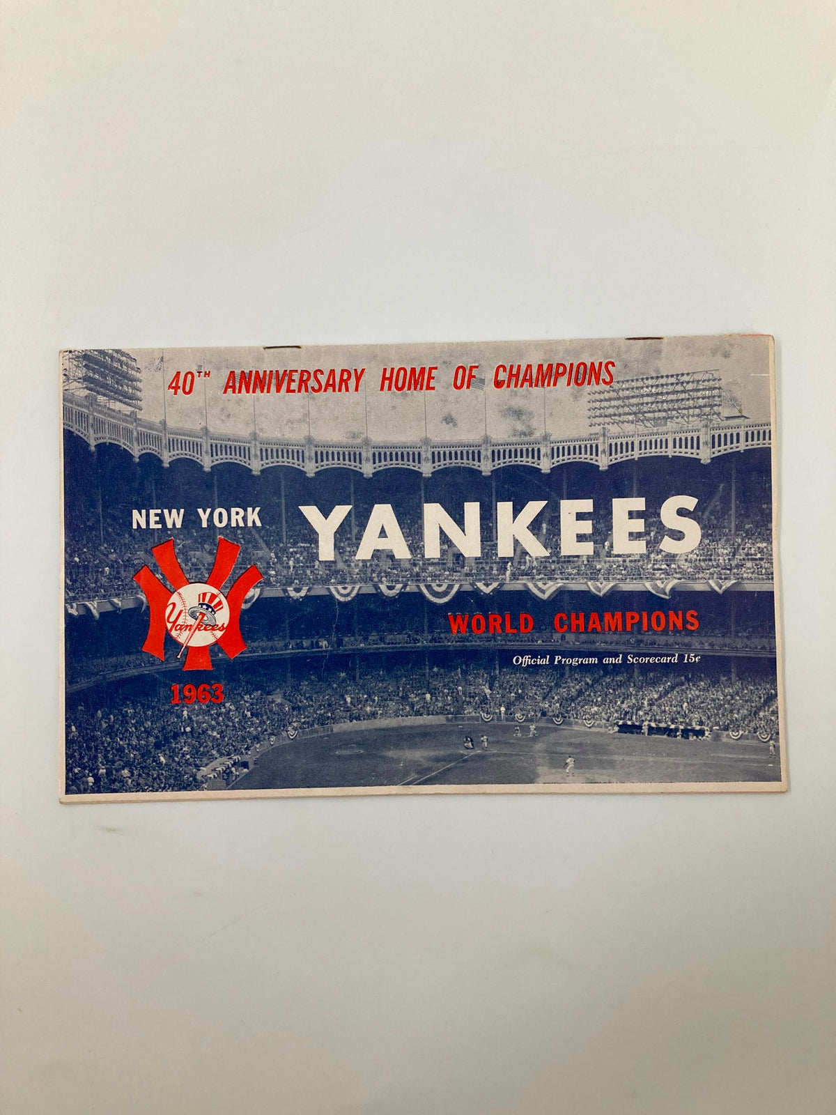 1963 MLB New York Yankees World Champions Official Program and Scorecard cover featuring the iconic Yankees logo and a historic image of Yankee Stadium.