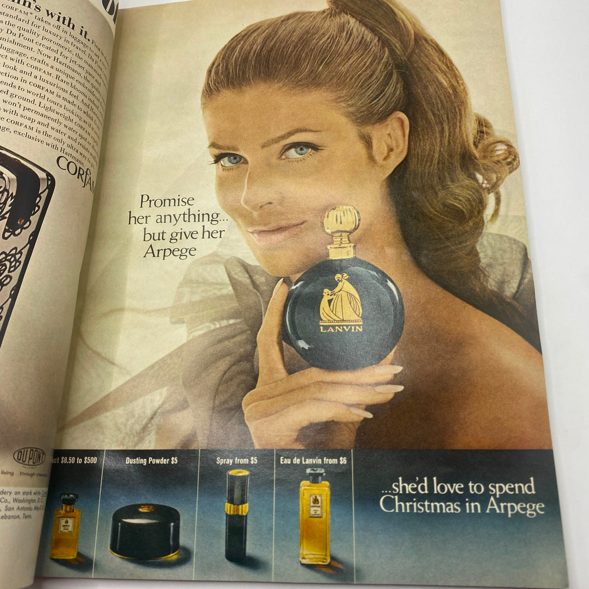 Vogue Magazine November 15, 1967 advertisement for Lanvin Arpege perfume, featuring a model holding a fragrance bottle.