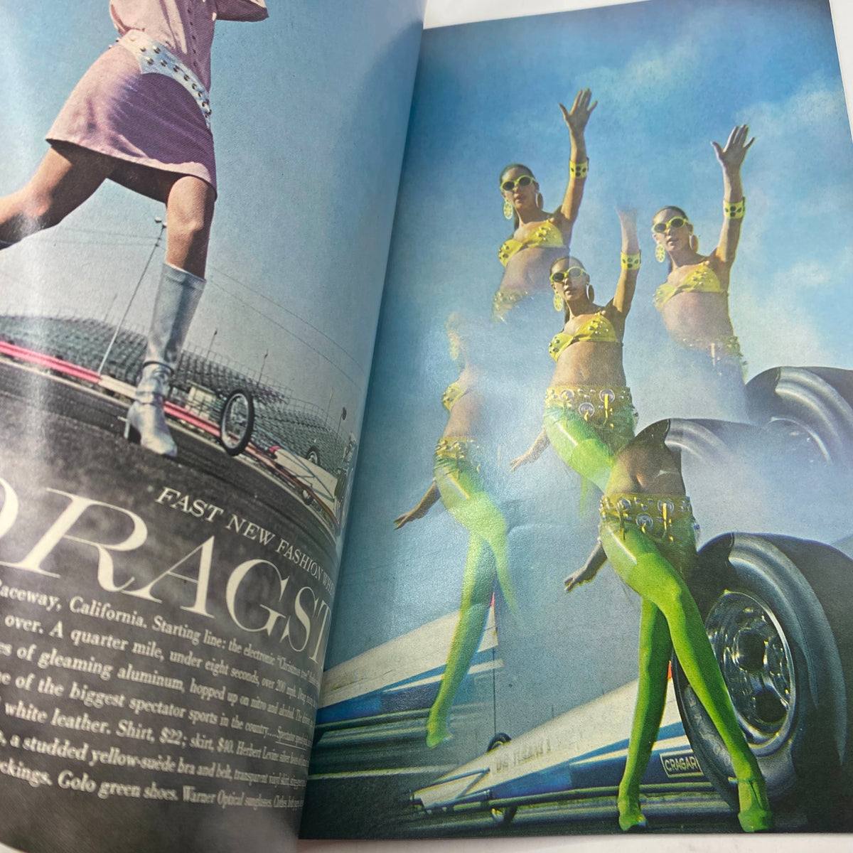 VTG Vogue Magazine April 15, 1967 - Twiggy by Bert Stern showcasing a vibrant fashion spread with models in colorful outfits at a California raceway.