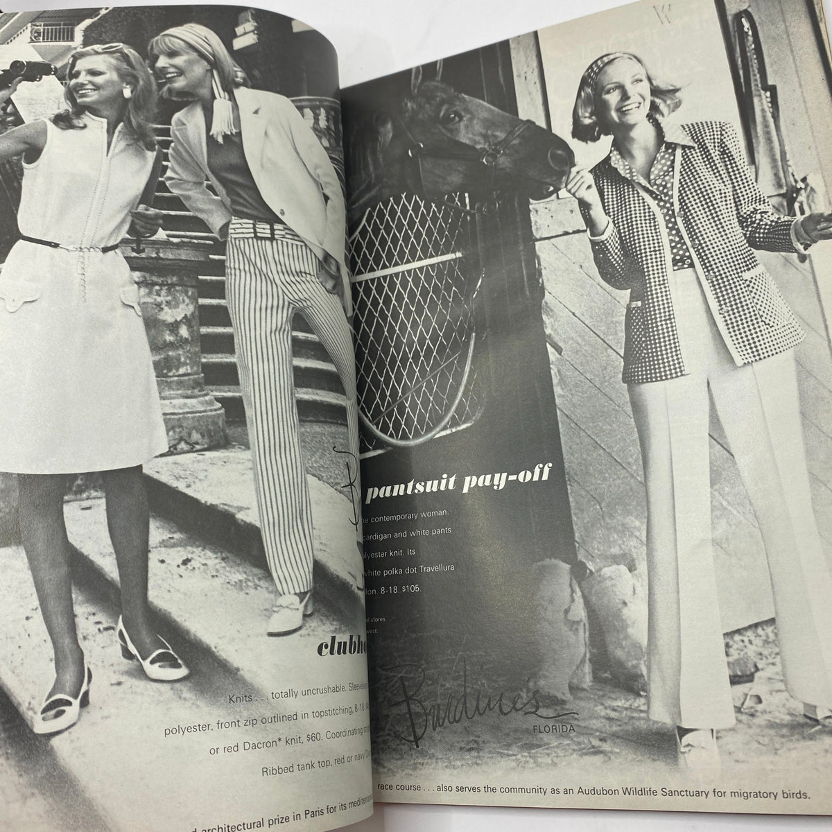 Black and white fashion advertisement from VTG Vogue Magazine March 1, 1972 featuring women in stylish attire beside a horse, emphasizing contemporary fashion.