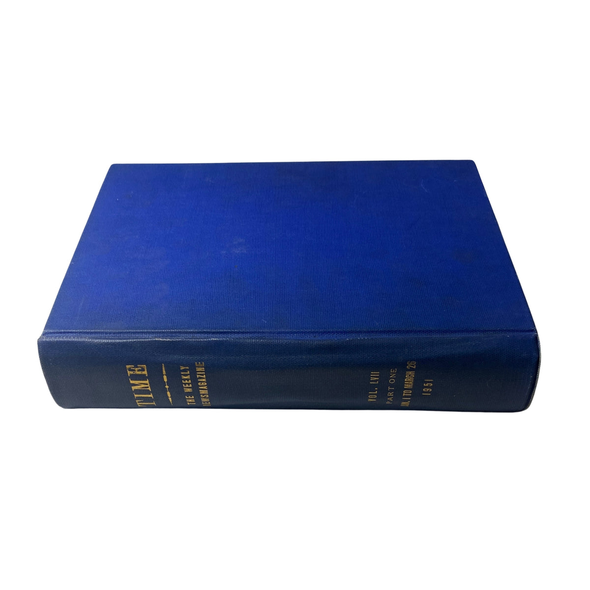 Side view of the Time Magazine Library Bound Weekly, January 1 to March 26, 1951, highlighting the title and volume details in gold lettering on a blue background.