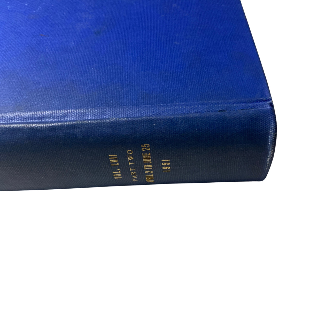 Detailed view of the spine of 'Time Magazine Library Bound April 1951 - June 25 1951 Irans Mohammed Mossadeq' marked with 'Volume LVII Part Two April 2 June 25 1951'.