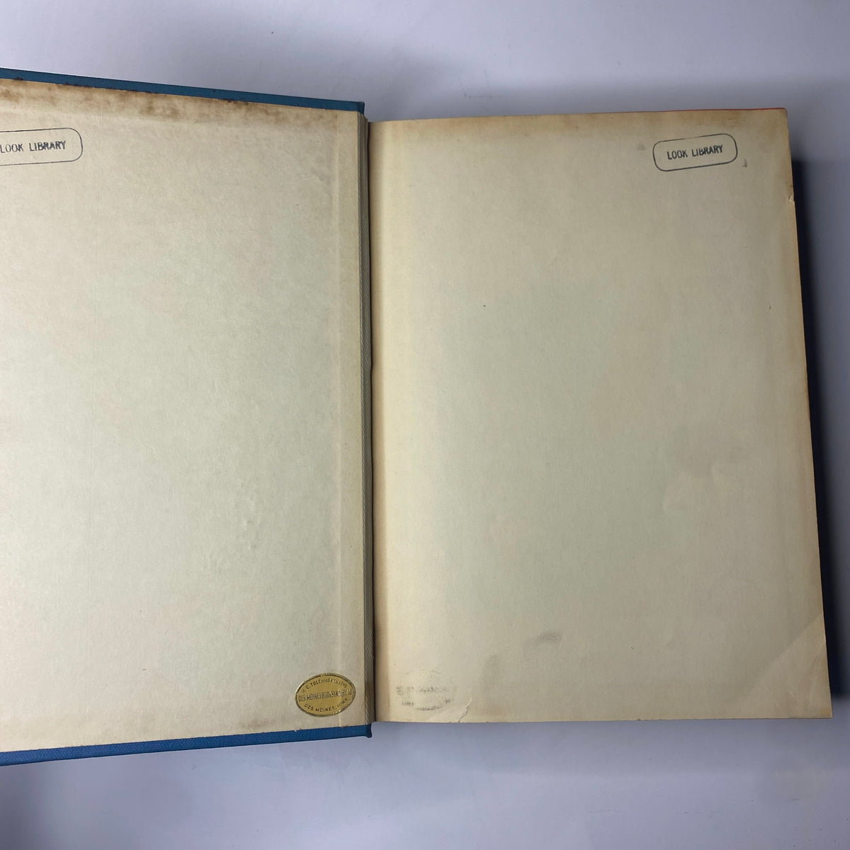 Interior view of the Time Library Bound Weekly magazine displaying blank pages with library stickers, spanning the issues from October 3 to December 26, 1949.