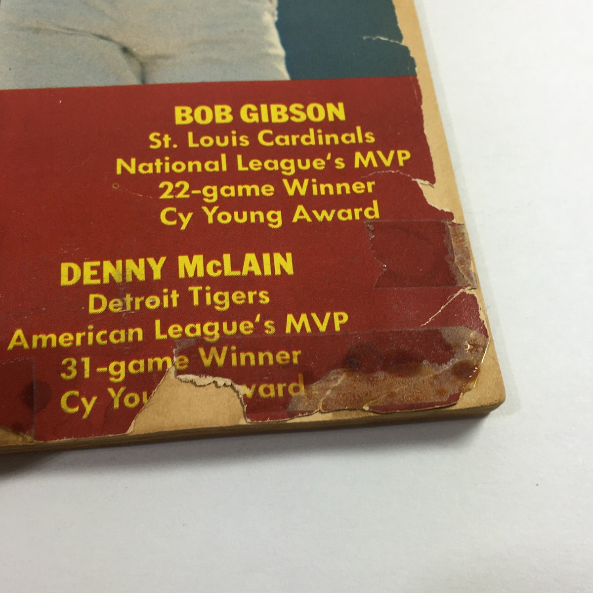 Detailed view of the back cover of the VTG Street & Smith's Baseball 1969 Yearbook, featuring player statistics for Bob Gibson and Denny McLain, highlighting their MVP statuses and awards.
