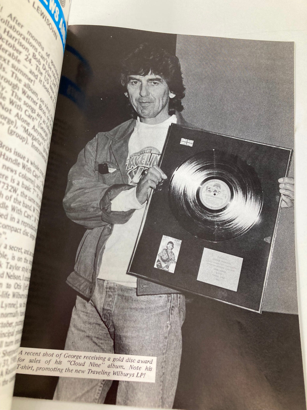 The Beatles Book Monthly Magazine November 1988 No. 151 showcasing George Harrison holding a gold disc award for his 'Cloud Nine' album, emphasizing the significance of this collectible magazine in celebrating the achievements of The Beatles.