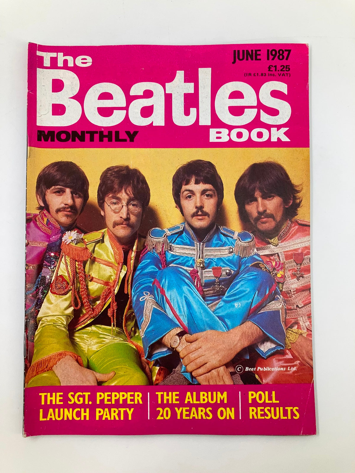 The Beatles Book Monthly Magazine June 1987 No. 134 cover featuring The Beatles dressed in Sgt. Pepper uniforms, celebrating the album's 20th anniversary.