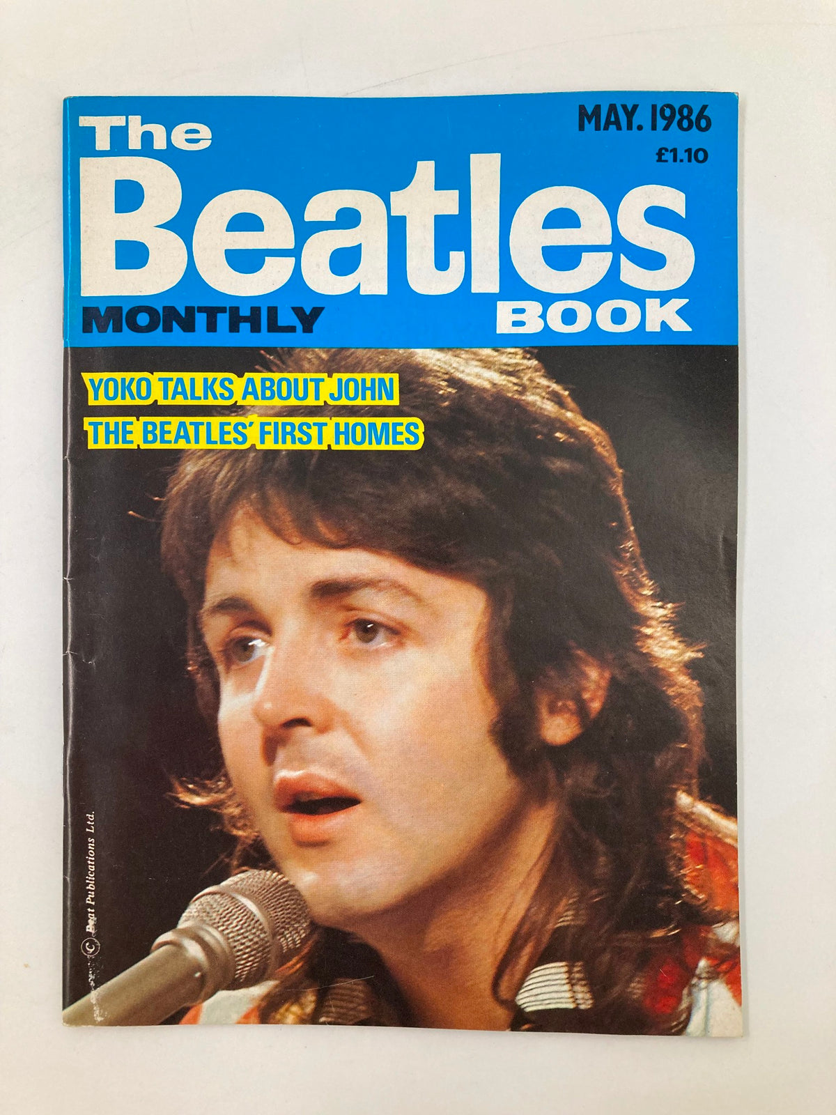 The Beatles Book Monthly Magazine May 1986 Issue #121 featuring Paul McCartney on the cover with images of the iconic band, highlighting features such as 'Yoko Talks About John'.