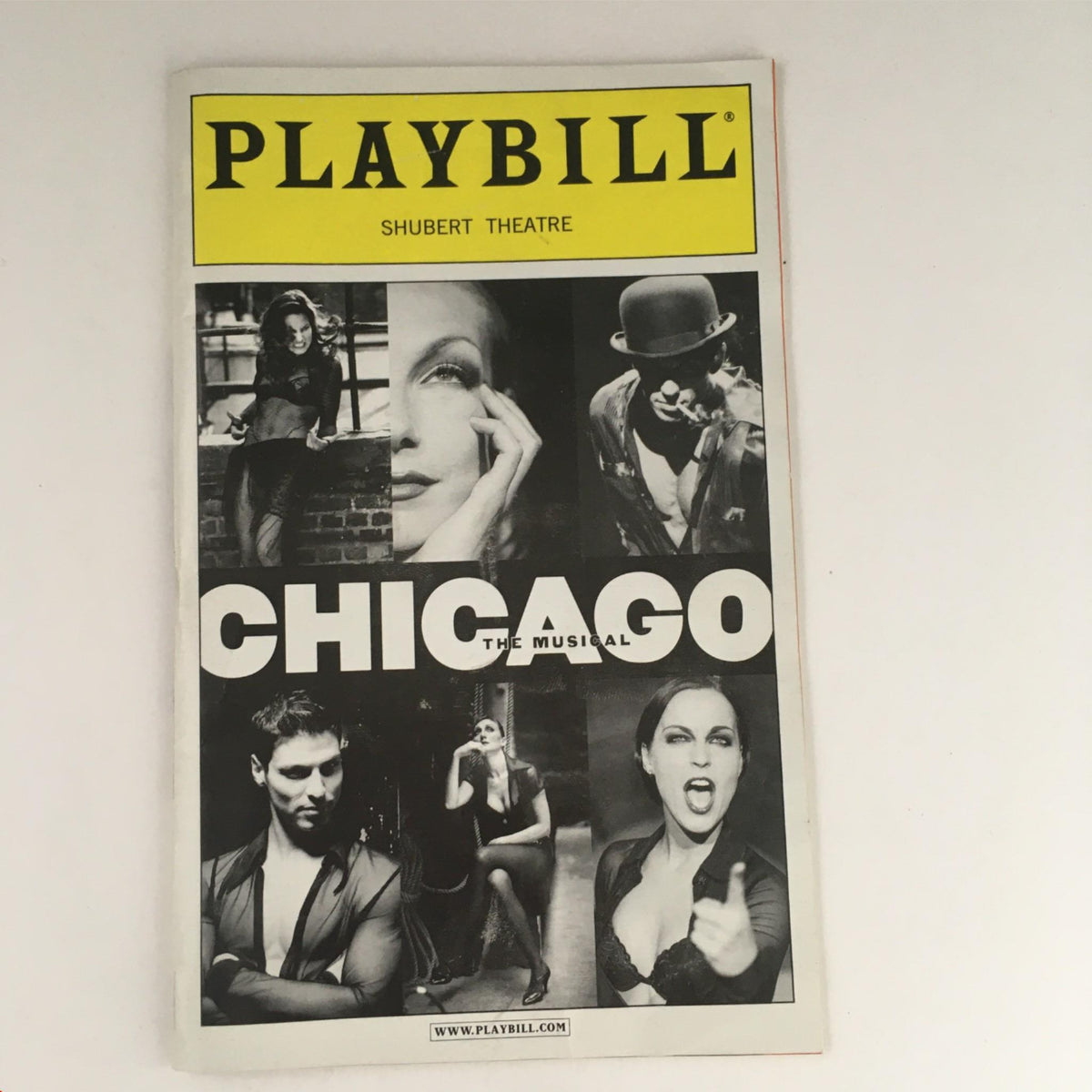 2001 Playbill Chicago The Musical by Walter Bobbie, showcasing a striking black and white cover design with stylized images of key performers from the iconic production.