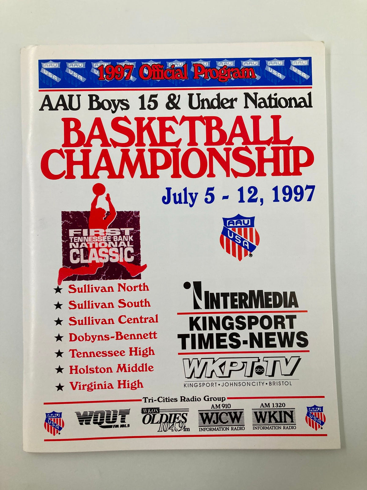 1997 Official Program for the AAU Boys 15 & Under National Basketball Championship held from July 5-12, featuring team names and tournament details, in very good condition.