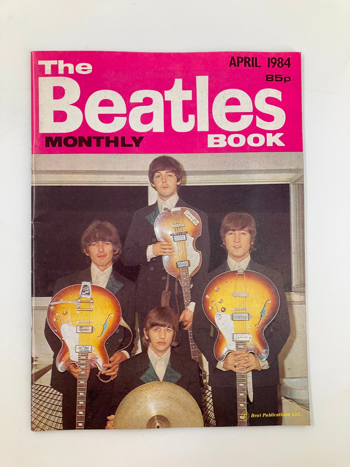 The Beatles Book Monthly Magazine April 1984, Issue #96 featuring a colorful cover with images of the band members holding guitars.