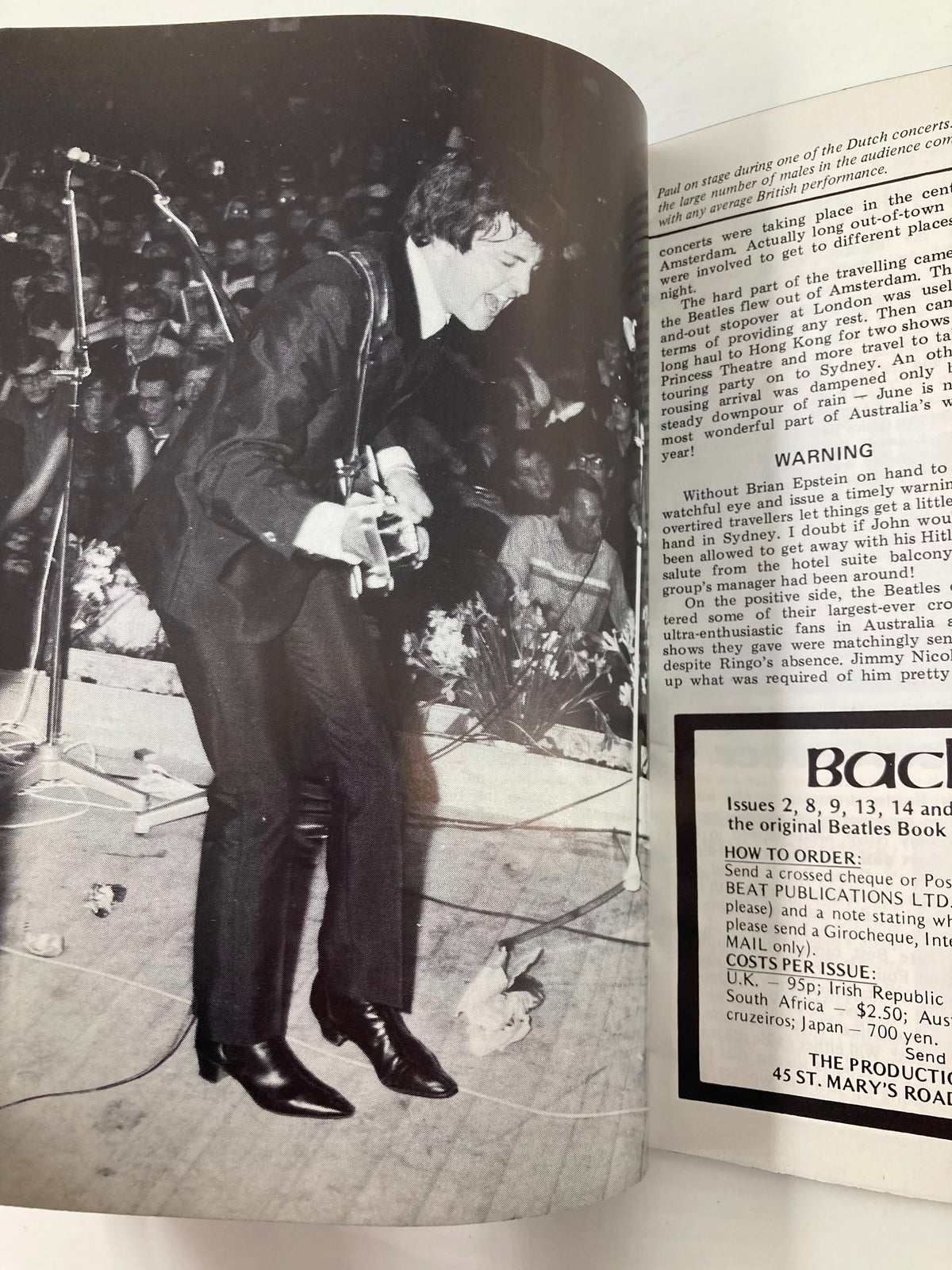A dynamic performance image of Paul McCartney from The Beatles Book Monthly Magazine July 1984 #99, showcasing him on stage during a concert.