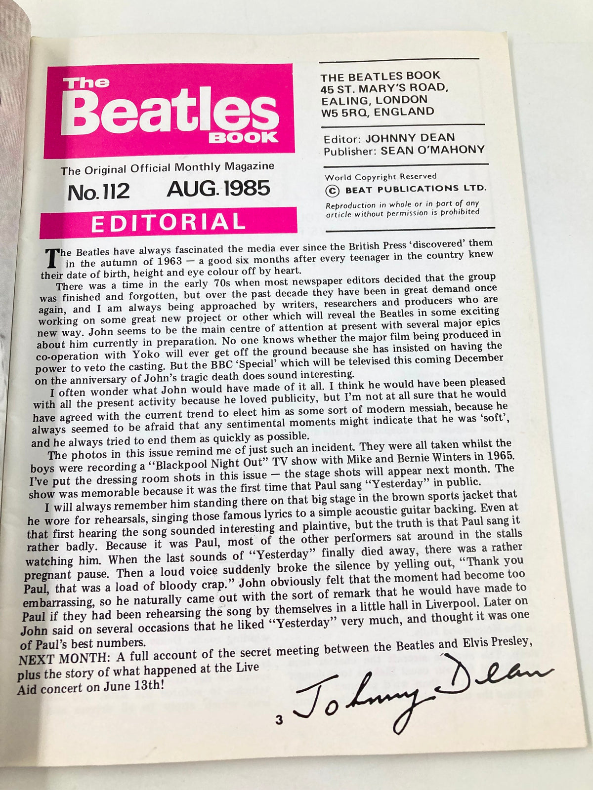 The Beatles Book Monthly Magazine August 1985 Issue #112 editorial page featuring a pink title banner and a handwritten signature of Johnny Dean, showcasing nostalgic content related to The Beatles.