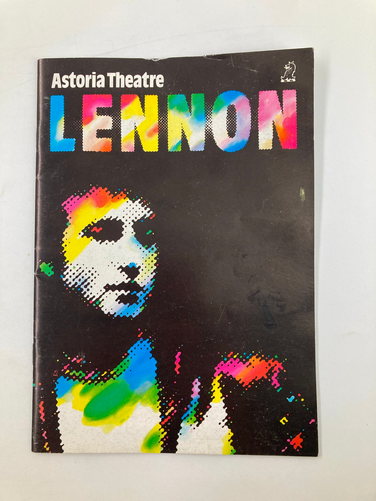 Cover of the vintage magazine '1985 John Lennon at the Astoria Theatre by Bob Eaton' featuring a colorful design with the title 'LENNON' in vibrant typography.