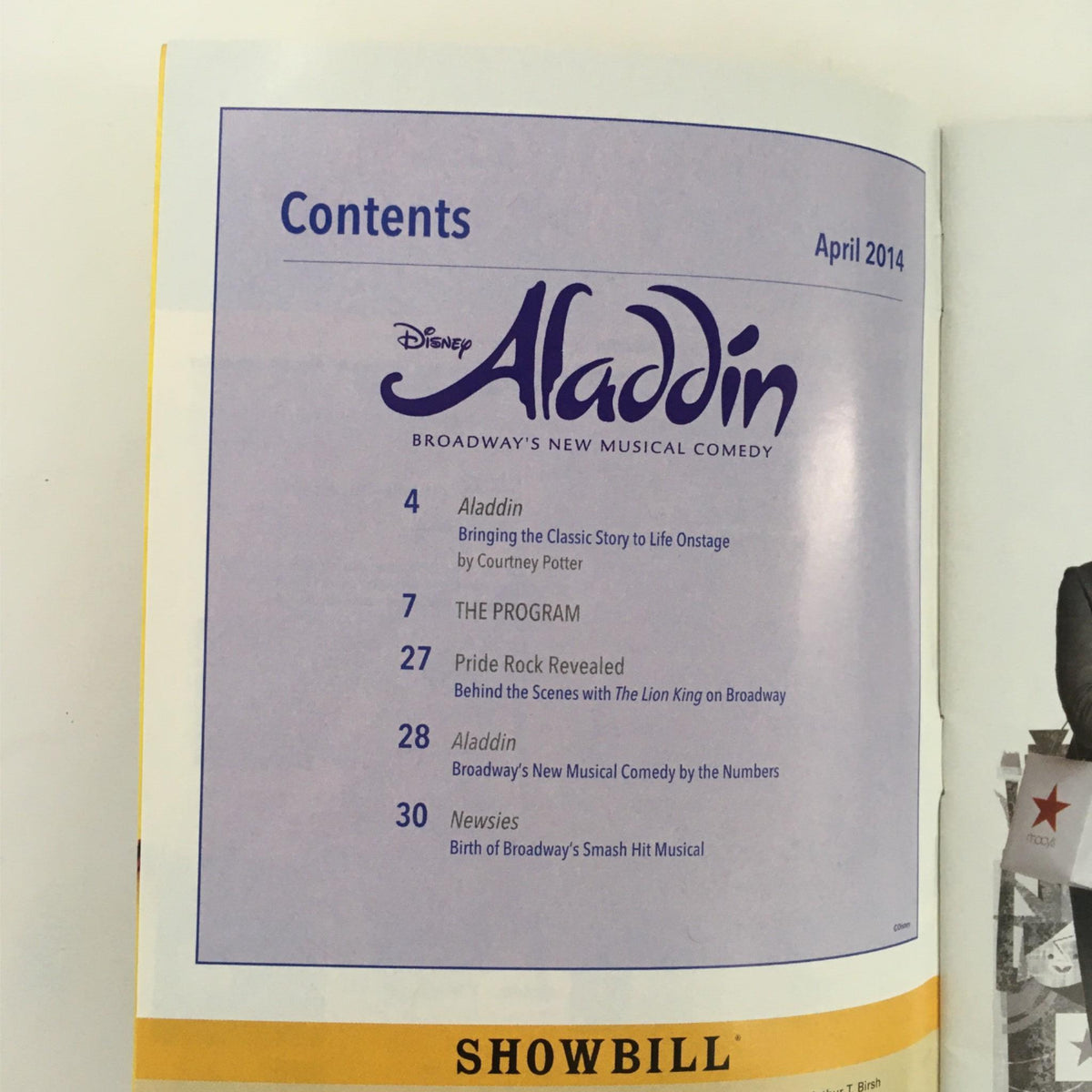 2014 Showbill Disney's Aladdin by Casey Nicholaw at New Amsterdam Theatre - Contents page displaying articles, including 'Bringing the Classic Story to Life Onstage' and a program overview.