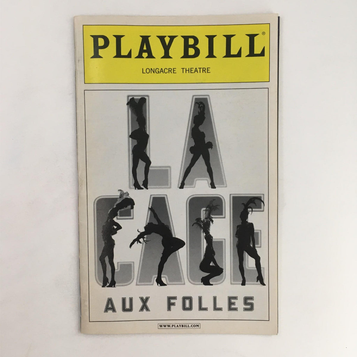 2011 Playbill La Cage Aux Folles featuring an artistic cover design, showcasing silhouettes of performers, presented at the Longacre Theatre. A collectible item for Broadway enthusiasts.