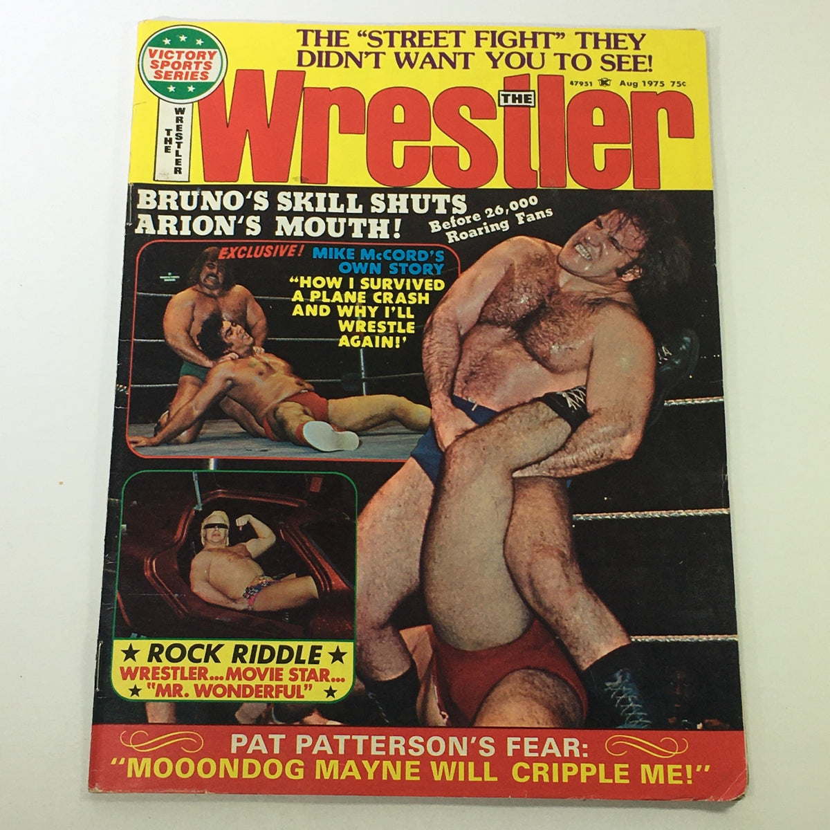 Cover of VTG The Wrestler Magazine August 1975 featuring Bruno Sammartino vs Spiros Arion, showcasing a wrestling match with vibrant colors and bold headlines.