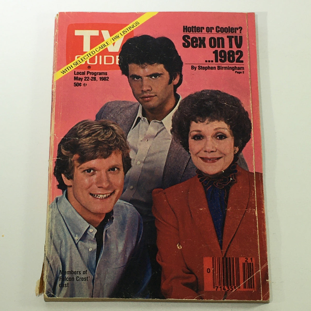 Vintage TV Guide magazine cover from May 22-28, 1982 featuring Lorenzo Lamas, Jane Wyman, and David Selby. The vibrant pink background highlights the text 'Hotter or Cooler? Sex on TV ... 1982' with a focus on popular television culture from the early 1980s.