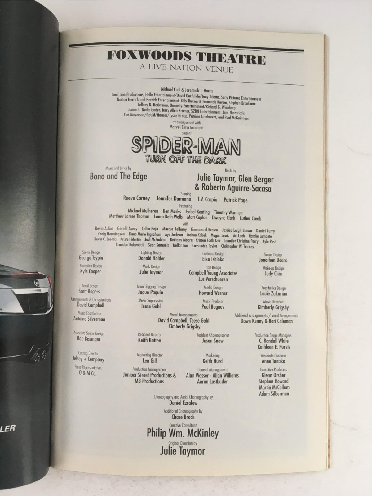 2011 Playbill for Spider-Man Turn Off The Dark by Julie Taymor at Foxwoods Theatre, featuring cast list and production details.