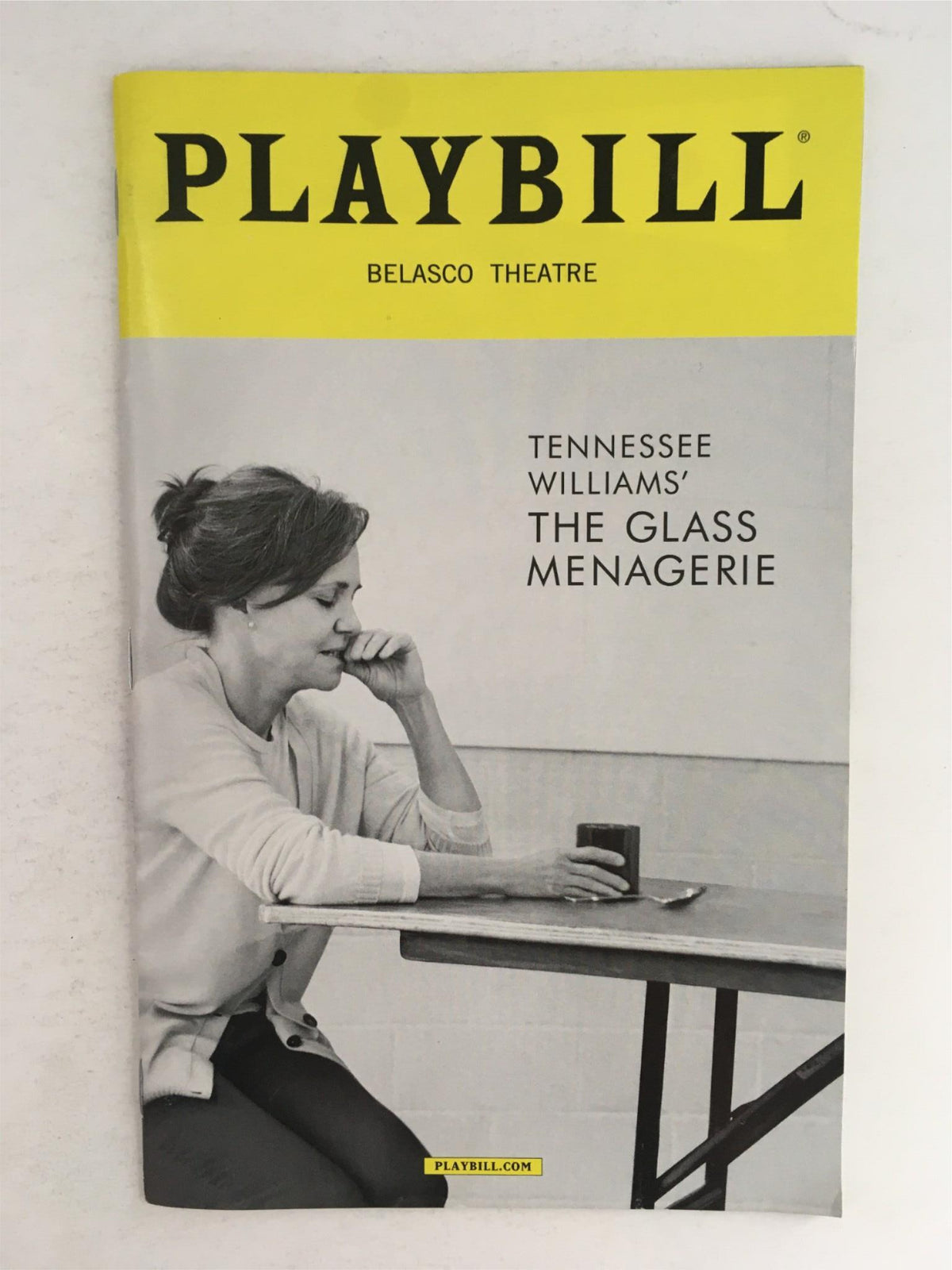 2017 Playbill for 'The Glass Menagerie' by Tennessee Williams, featuring a black and white image of a woman in contemplation at Belasco Theatre.