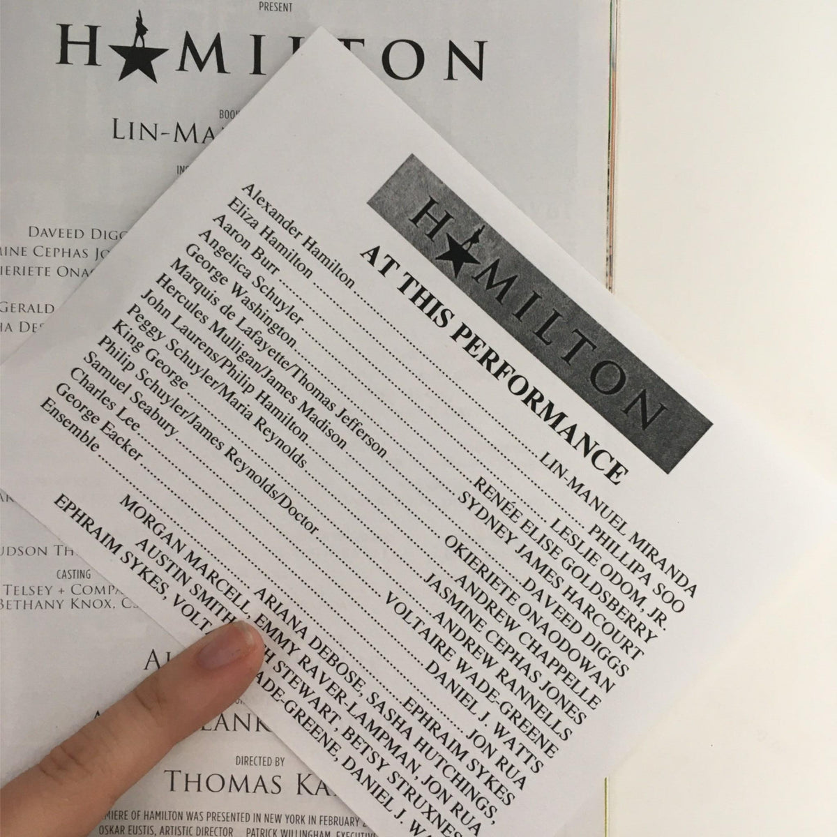 2015 Playbill for Hamilton by Lin-Manuel Miranda, featuring the cast list and performance details at Richard Rodgers Theatre.