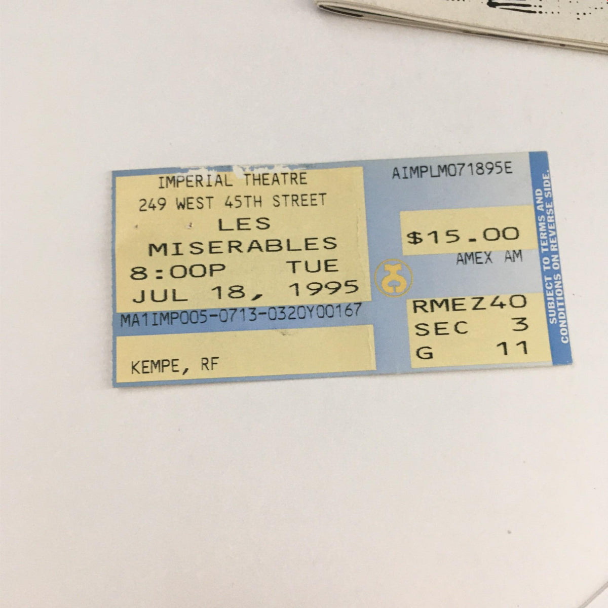 1995 Playbill Les Misérables by Victor Hugo, showcasing the original ticket for the performance at Imperial Theatre, highlighting the date and seat information.