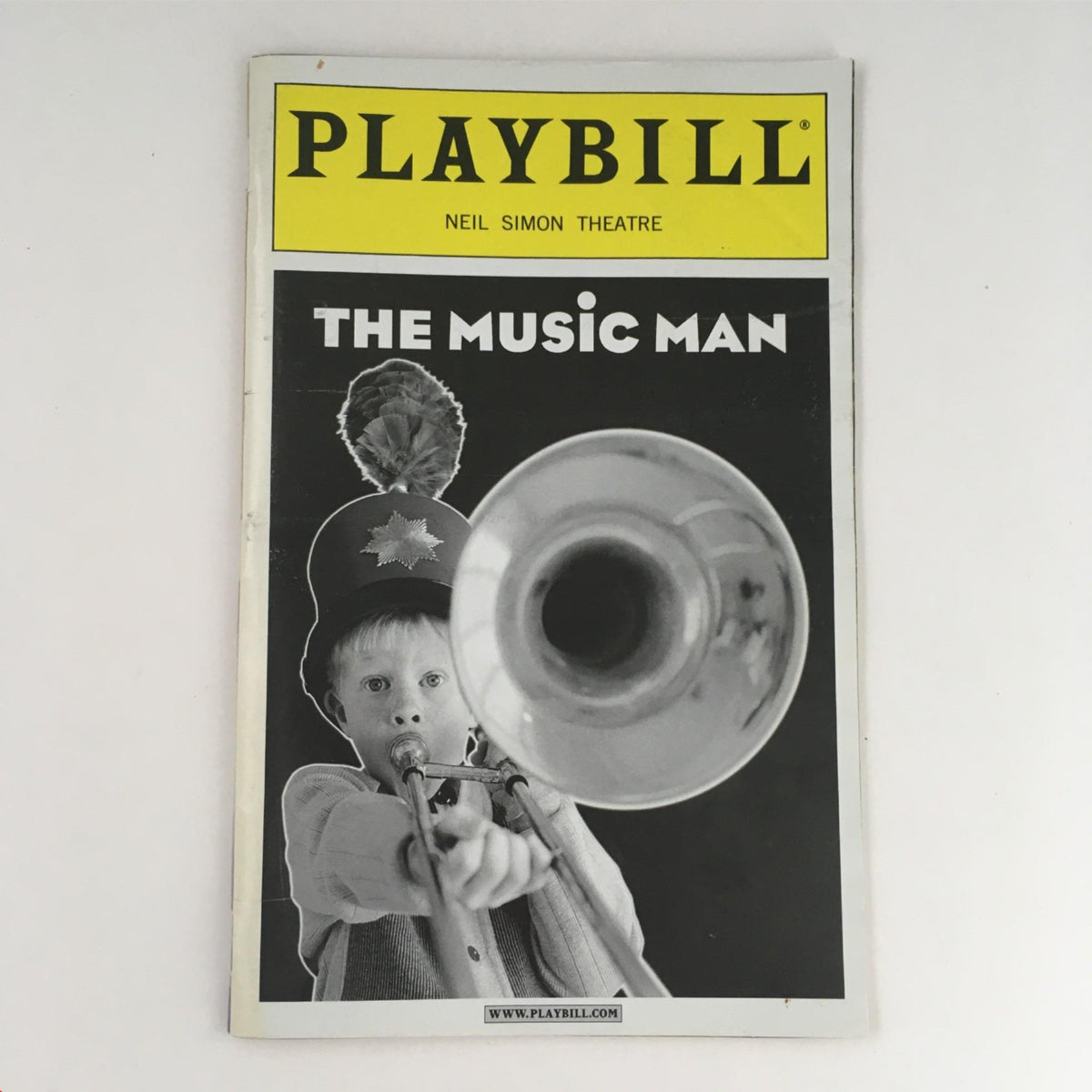 2000 Playbill The Music Man cover showcasing a child with a brass instrument at the Neil Simon Theatre.
