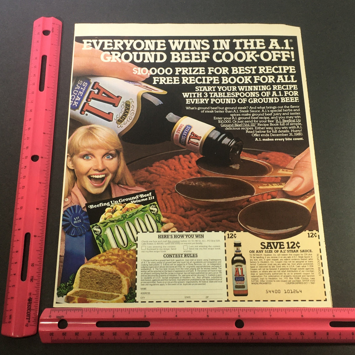 VTG Retro 1981 Brand's A1 Steak Sauce advertisement featuring a cooking contest promotion, showcasing a recipe contest with an image of A1 Sauce and ground beef, along with a coupon offer.