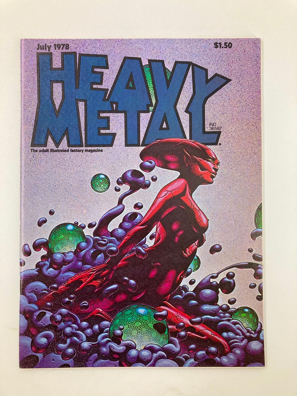 Cover of VTG Heavy Metal Magazine from July 1978 featuring vibrant fantasy art and the title 'Heavy Metal: The adult illustrated fantasy magazine'. This issue includes 'The Death of Orlaon' and is in near mint condition.