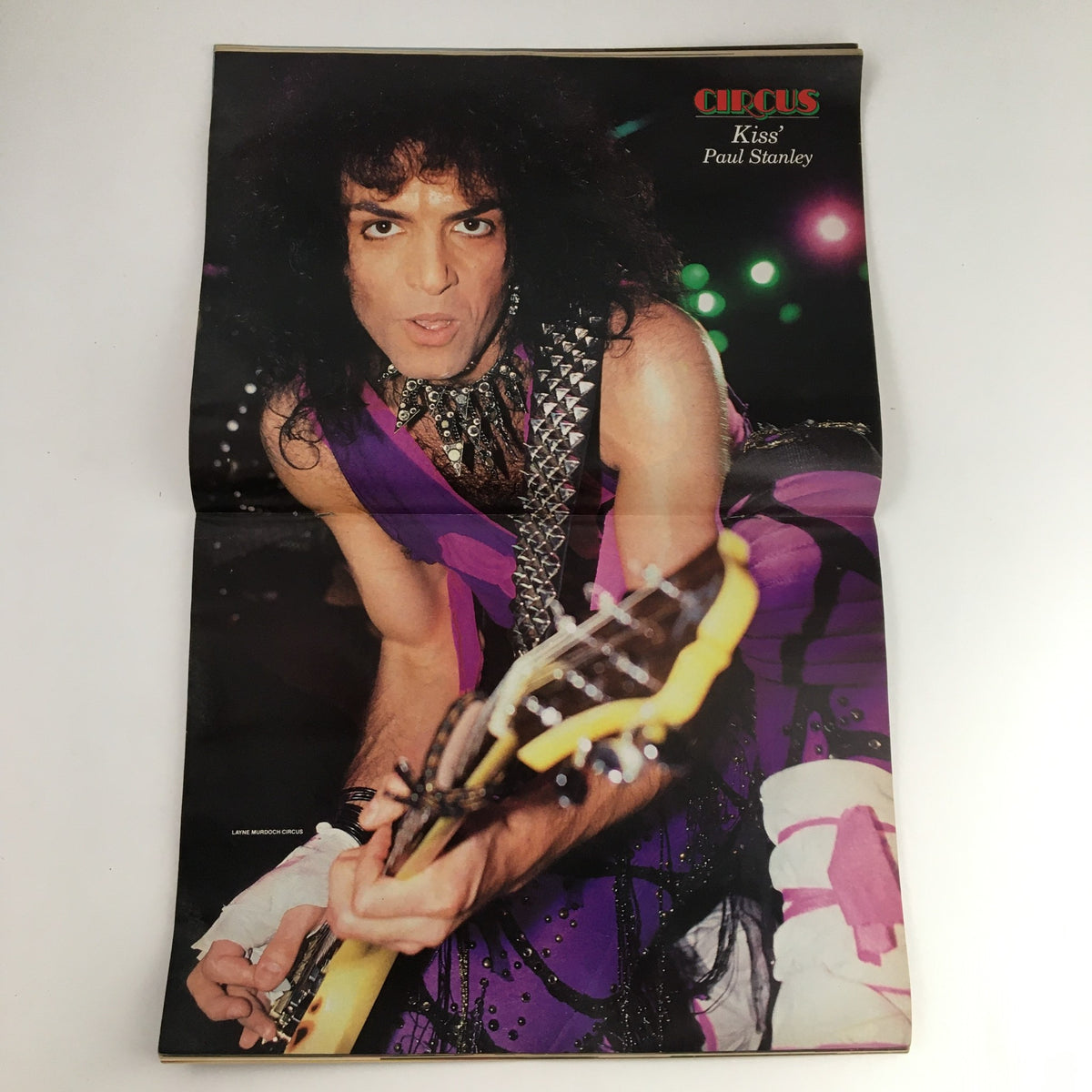 Poster of Paul Stanley from Kiss included in Circus Magazine August 31 1985, capturing the iconic rock star performing with a vibrant guitar and dramatic stage presence.