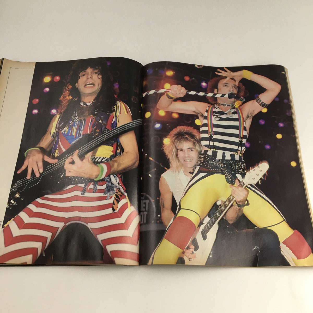 Circus Magazine January 31 1985 image depicting a vibrant live concert scene with musicians performing in colorful costumes and striped clothing.