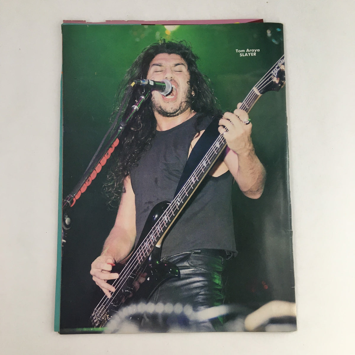 Page from Thrashin' Metal Shots Magazine September 1991 displaying a striking image of Tom Araya from Slayer during a live performance.