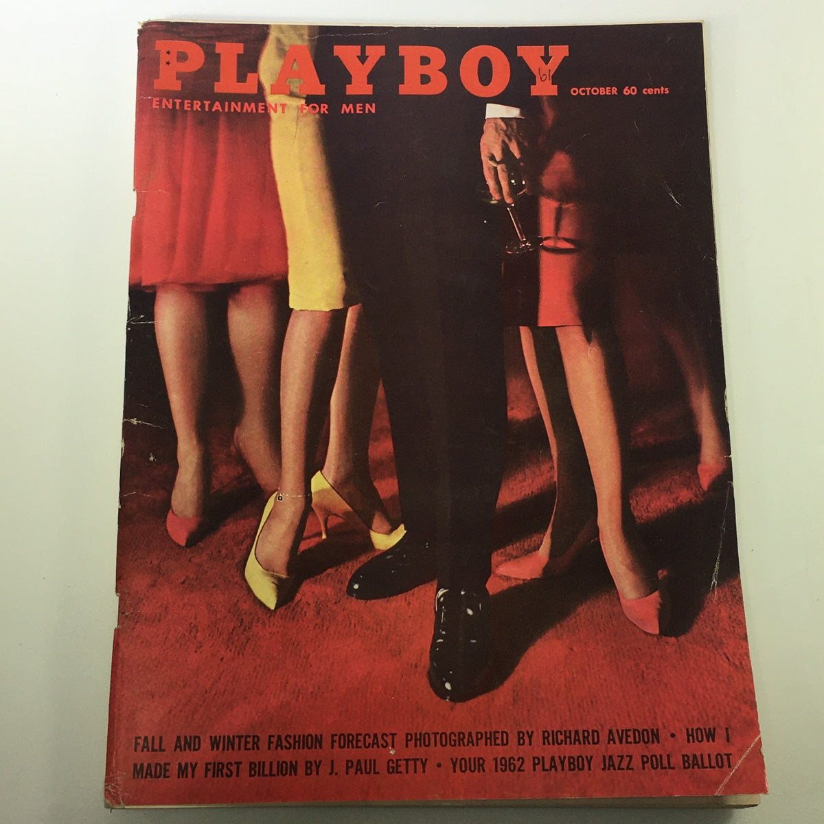 Cover of Vintage Playboy Magazine October 1961, Volume 8, Issue 10, photographed by Richard Avedon, showcasing 1960s fashion with women's legs in vibrant colored skirts.
