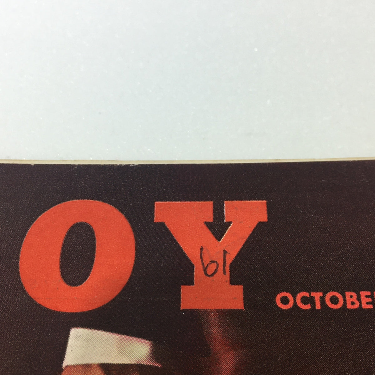 Close-up of the title on Vintage Playboy Magazine October 1961, with focus on the iconic red lettering and date, enhancing its vintage appeal.