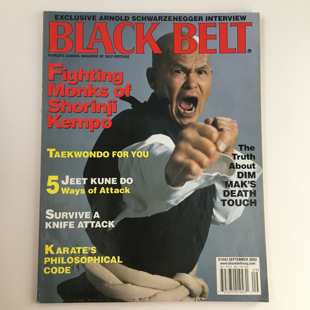 Black Belt Magazine September 2002 Vol 40 #9 featuring Toshio Kuramoto on the cover, showcasing martial arts themes with a striking image of a martial artist in action.