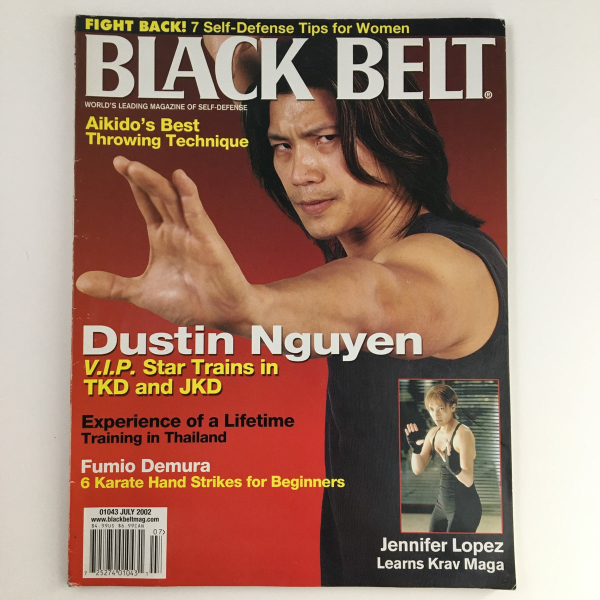 Cover of Black Belt Magazine July 2002 Vol 40 #7 featuring Dustin Nguyen demonstrating martial arts techniques and Jennifer Lopez learning Krav Maga.