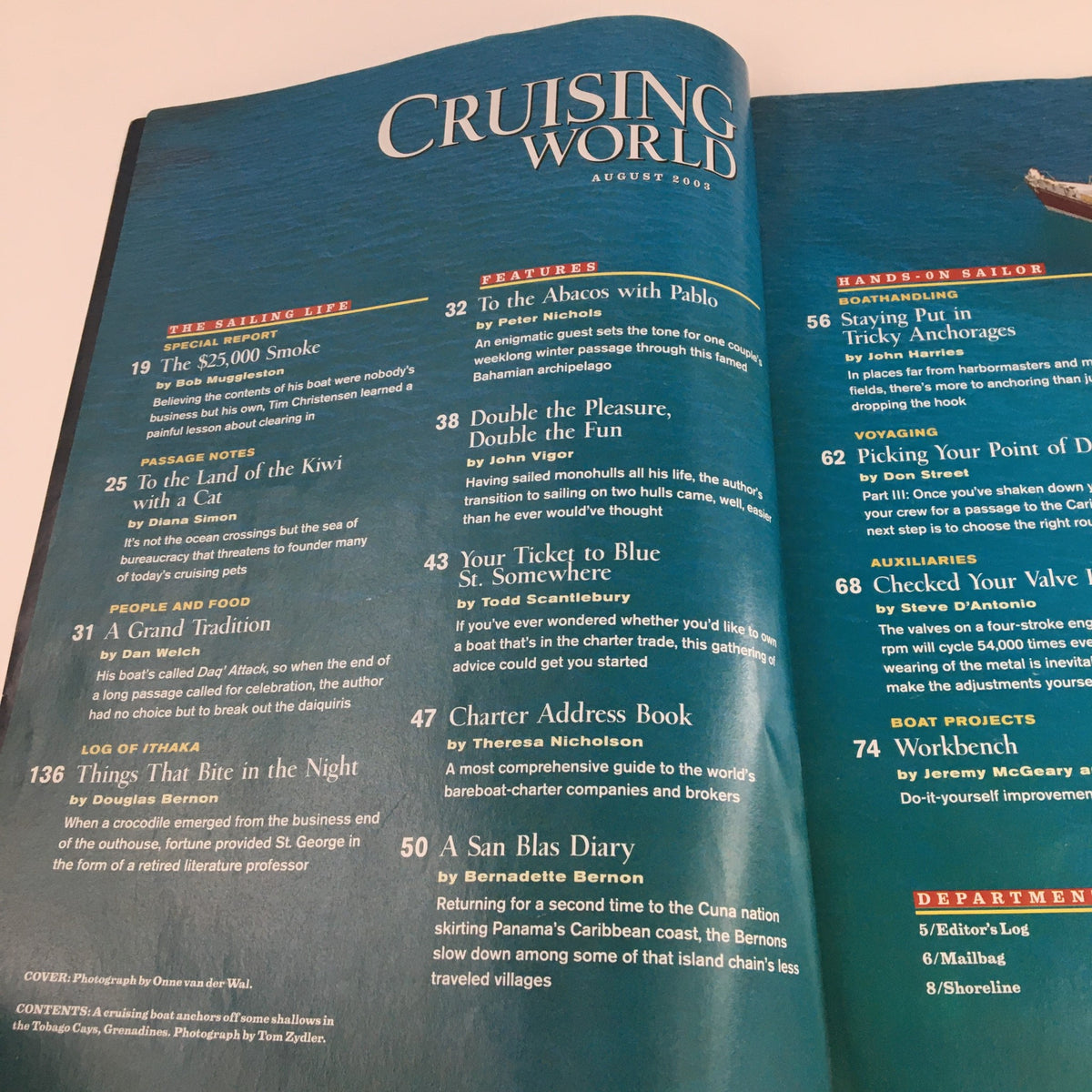 Cruising World Magazine August 2003 contents page featuring articles about sailing, including 'The $25,000 Smoke' and 'A Good Tradition'.