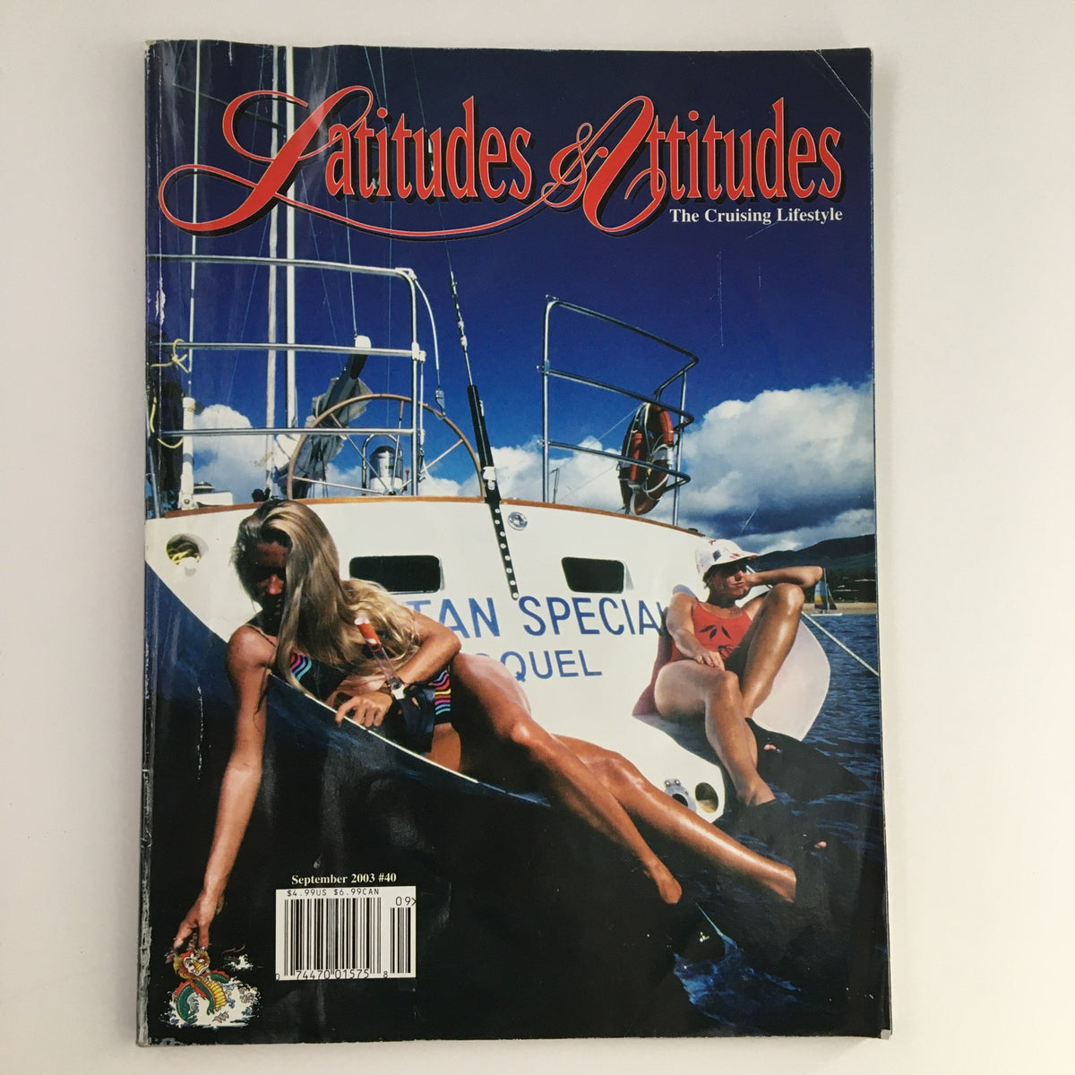Cover of Latitudes & Attitudes Magazine September 2003 featuring sailing enthusiasts on a boat with the title 'Latitudes & Attitudes Magazine September 2003 Ruffian S&S Pipedream, No Label'.