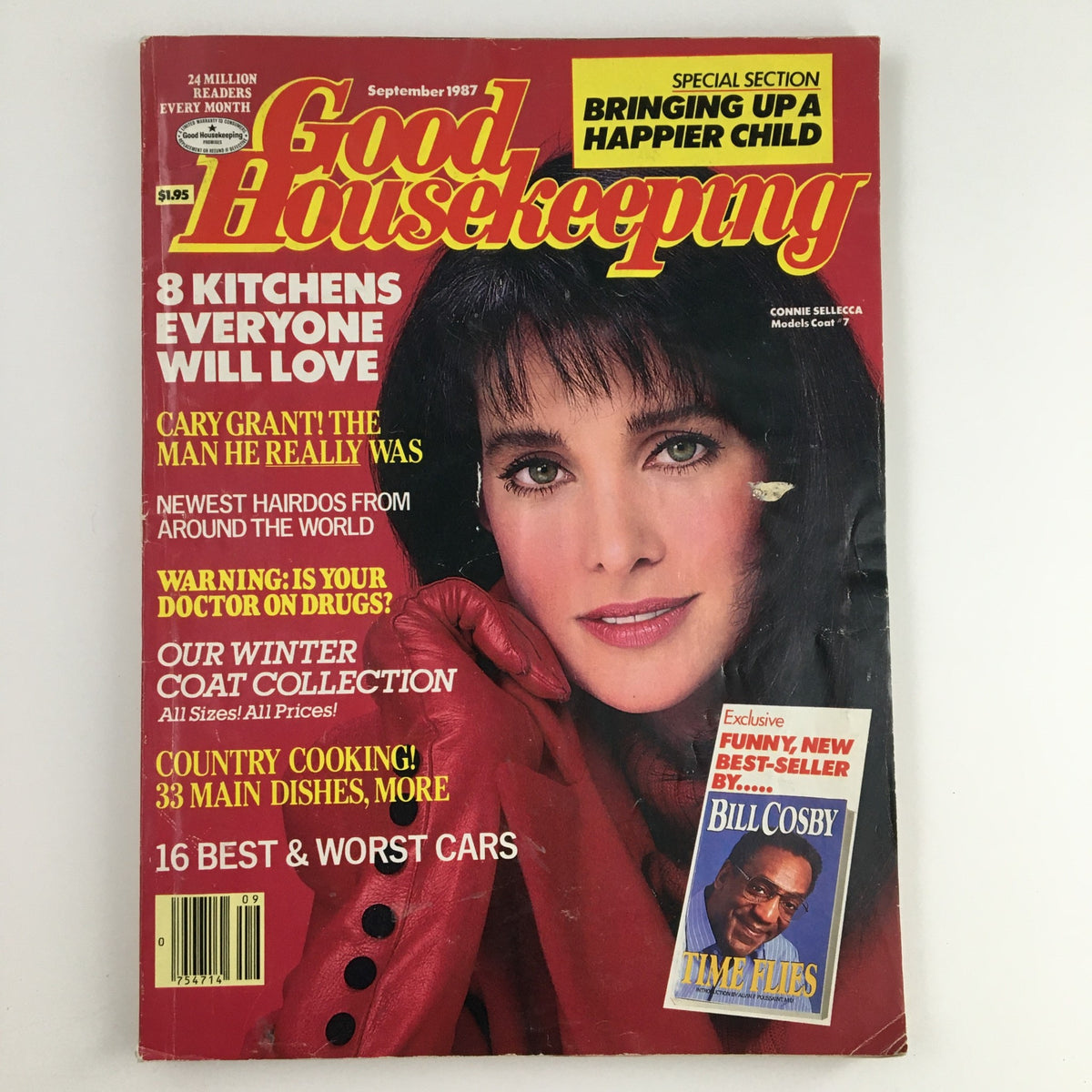 Cover of Good Housekeeping Magazine from September 1987 featuring Connie Sellecca and Bill Cosby. The magazine highlights articles on kitchens, hairdos, and includes a section on child upbringing. It shows minor wear and comes with a protective covering.