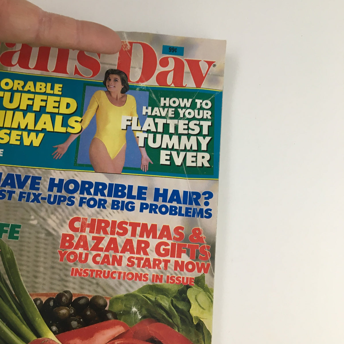 Close-up of the headline on Woman's Day Magazine August 23 1988, highlighting health tips and features like 'How to Have Your Flattest Tummy Ever'.