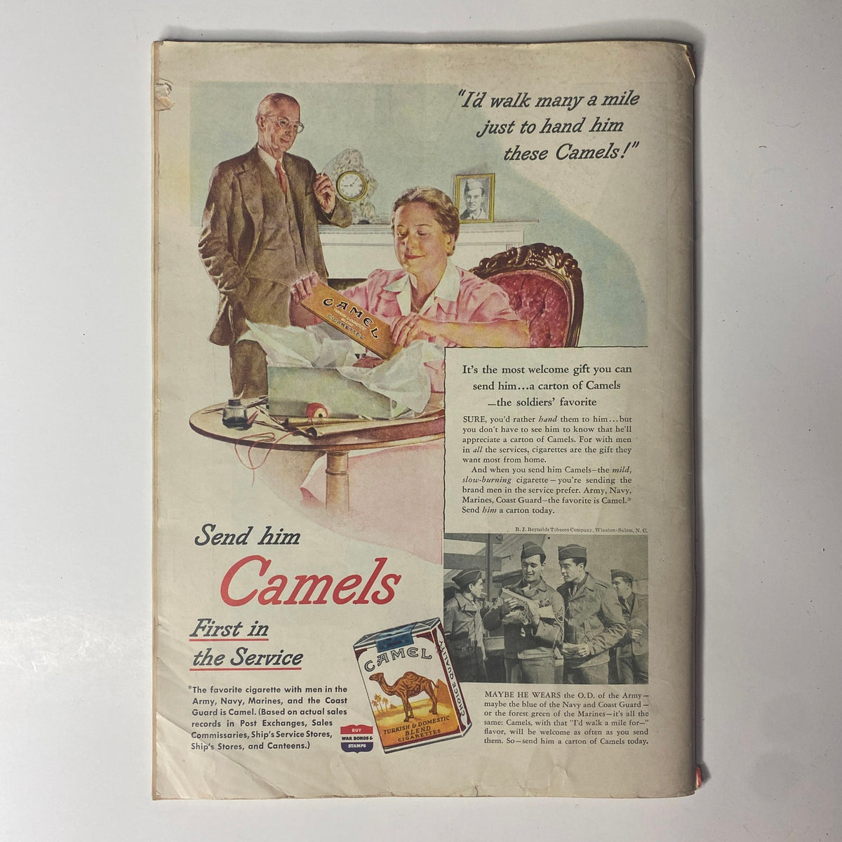 Vintage advertisement for Camel cigarettes featured in Time Magazine, promoting sending cartons to soldiers during World War II, emphasizing their popularity among military personnel.
