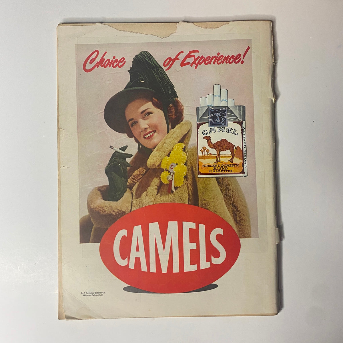 Advertisement for Camel cigarettes featuring a glamorous woman in vintage attire holding a cigarette, with the text 'Choice of Experience!' and an illustration of Camel cigarette pack. Related to Time Magazine November 8, 1948 J. Robert Oppenheimer.
