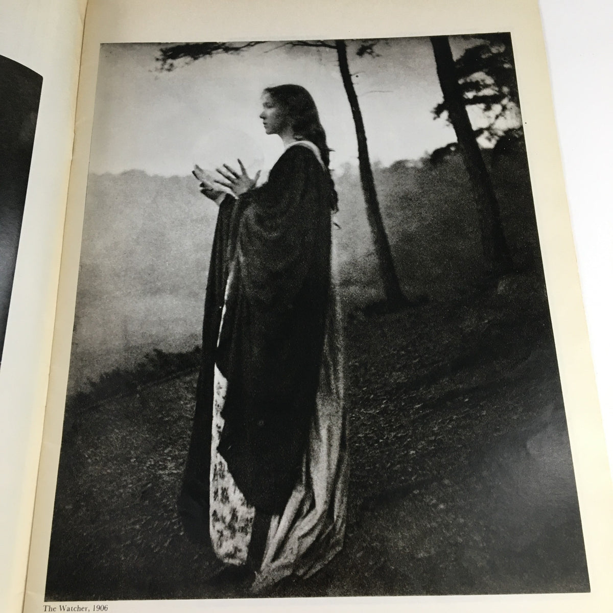 Creative Camera Magazine April 1976, a striking photograph titled 'The Watcher, 1906', by Wilhelm Schürmann, featuring a solemn figure in a natural landscape.
