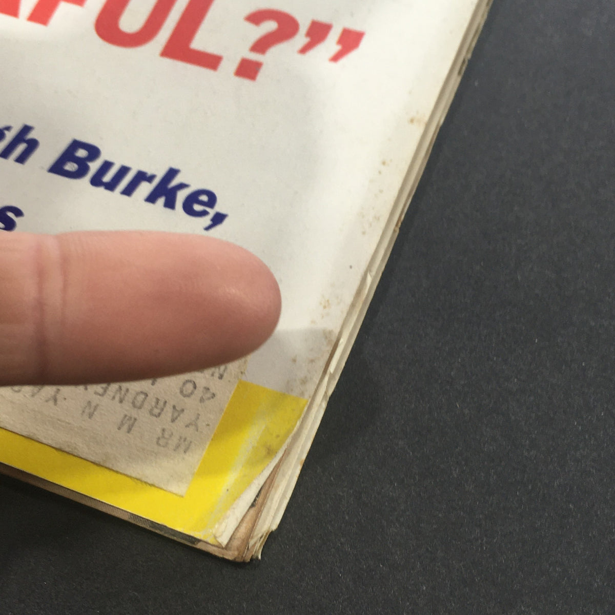 Close-up view of the edge of the cover of VTG U.S. News & World Report Magazine October 3, 1960, showing wear and an address label, with visibility of the headline discussing Admiral Arleigh Burke.